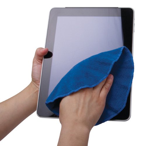 Photo of a pair of hands using the blue microfiber cloth to clean an iPad.