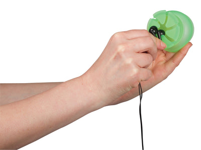 Photo of a pair of hands demonstrating how to insert a pair of black earbuds into a green nest.