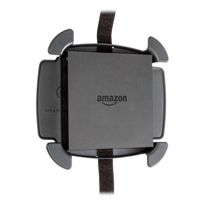 Studio photo of a Wrap Caddy holding an Amazon Fire TV streaming device, shown with the hook and loop strap opened.