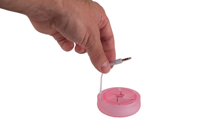 Photo of a hand demonstrating how to pull a pair of earbuds from a pink Nest.